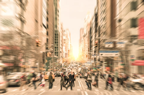 A busy road crossing in a busy city